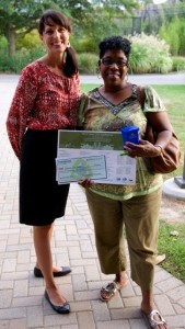 Shirley Smith, representing the Ingleside Civic League, with their EARNN check for participation in environmental sustainability projects.